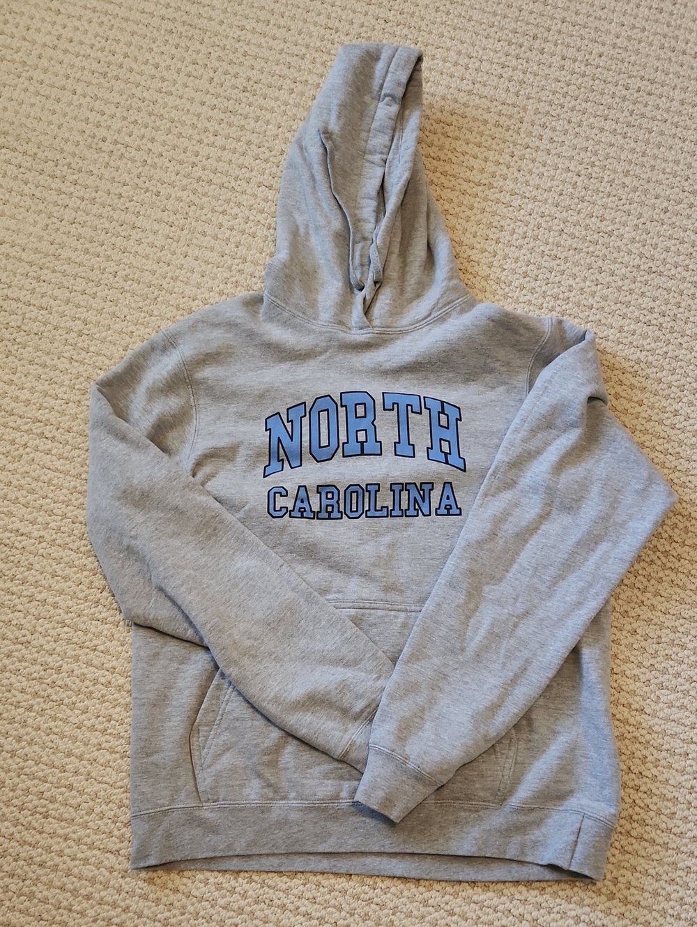 Port and Company Grey Hoodie with Blue 'North Carolina' Graphic